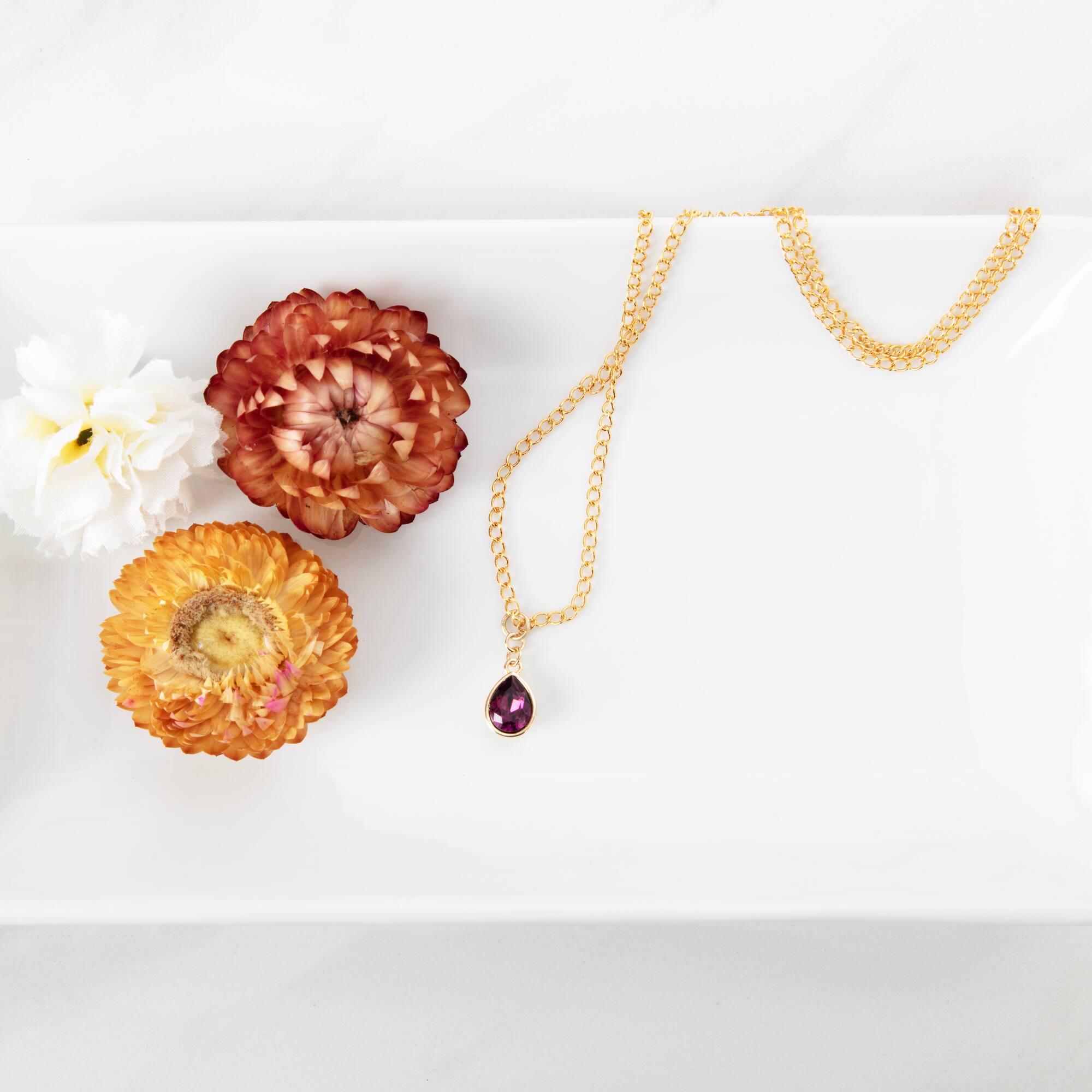 12 Pack: 14K Gold Plated Amethyst Austrian Crystal Pear Cut Charm by Bead Landing™